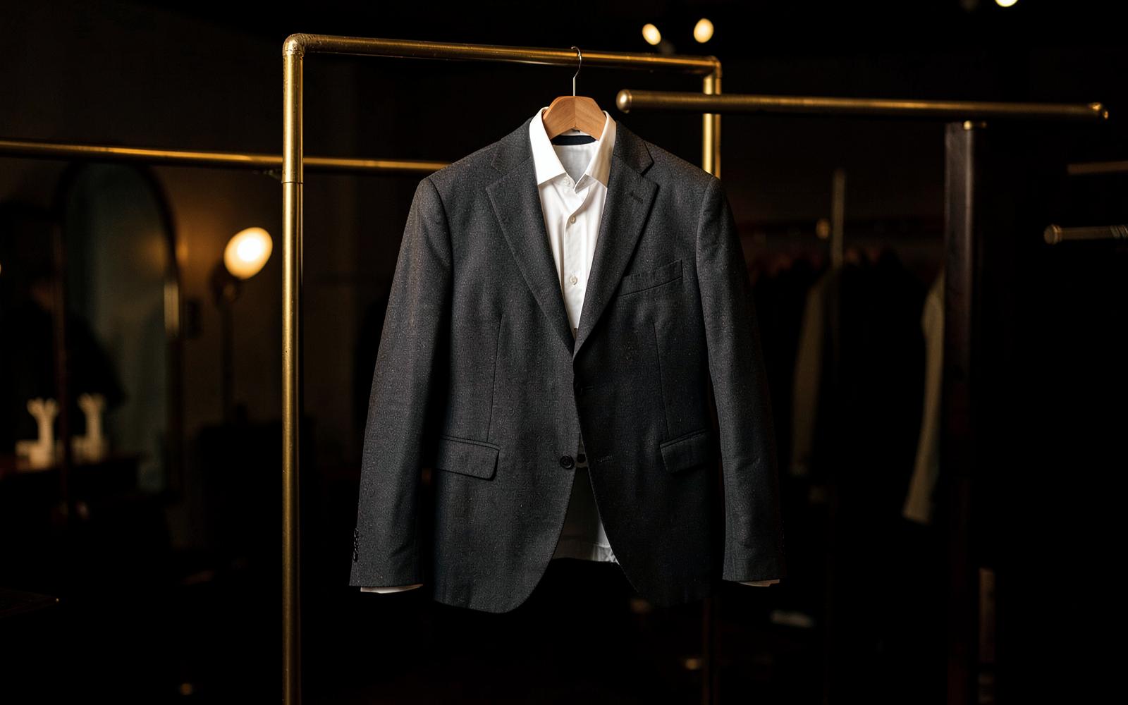 Tailored charcoal jacket and shirt finished by ASMA